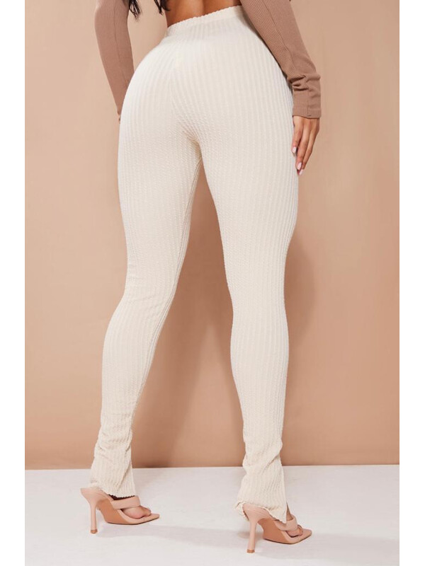 PANTALONI CU TIV DESPICAT