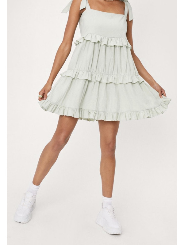 Rochie mini cu volan cu aspect de in Nasty Gal 