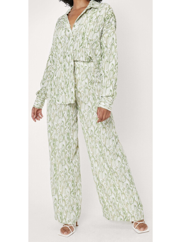 Pantaloni largi cu imprimeu abstract mic