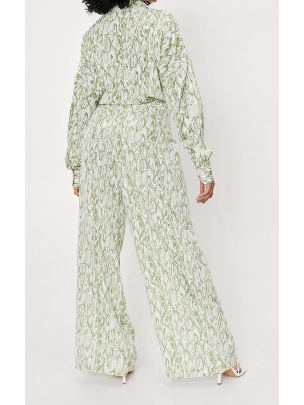 Pantaloni largi cu imprimeu abstract mic