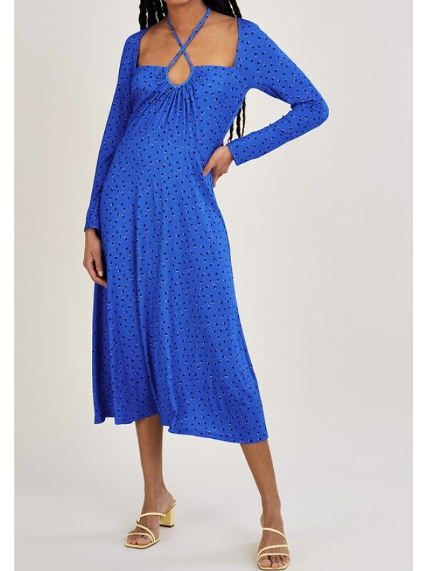 Rochie albastră din jerseu cu decupaje și model cu buline.