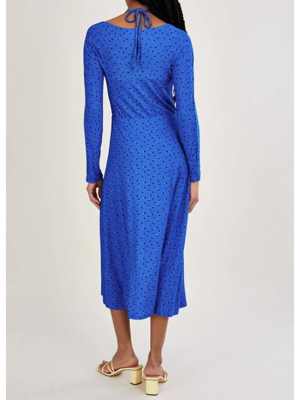 Rochie albastră din jerseu cu decupaje și model cu buline.