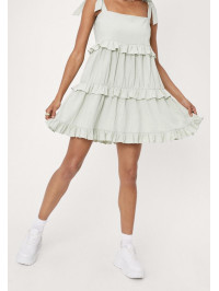 Rochie mini cu volan cu aspect de in Nasty Gal 