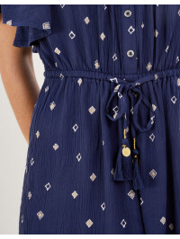 Salopetă scurtă albastră cu imprimeu decorativ